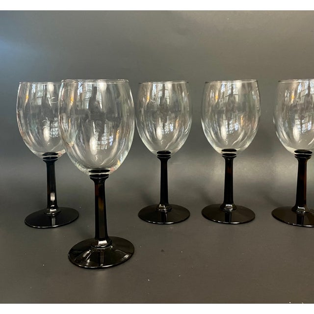Vintage set of 5 wine glasses by Crystal D’Arques / Arcoroc, made in France. These glasses feature sleek black hexagonal...