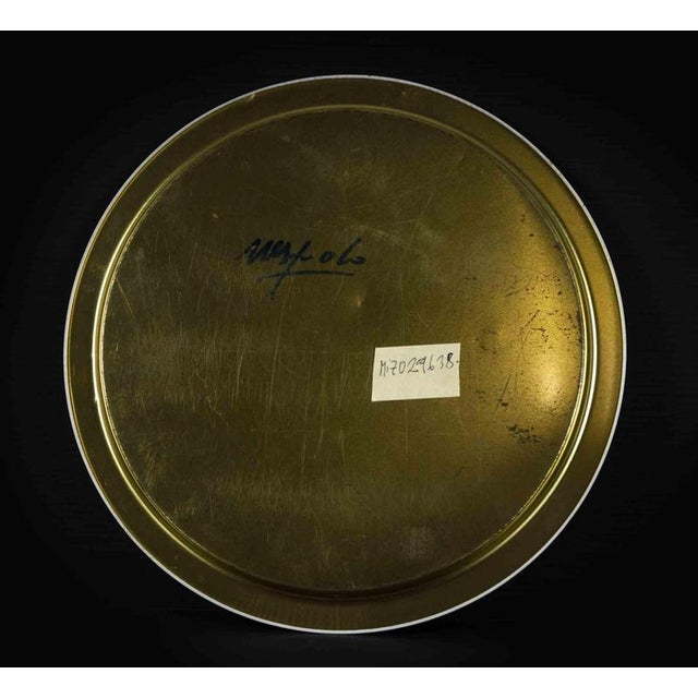 Ugo Nespolo plate is an original decorative object realized in the half of 20th century by the Italian artist Ugo Nespolo....