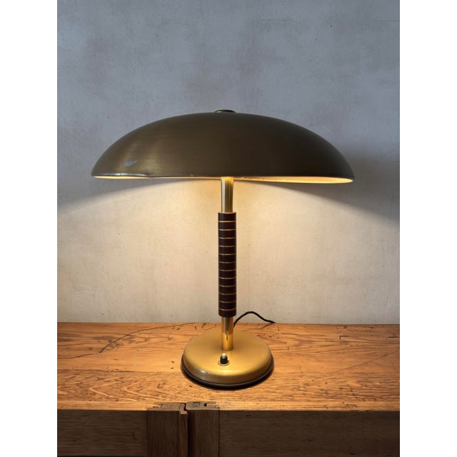 1940s gold ufo style table lamp by renowned german makers sbf sächsische bronzewarenfabrik. completely original steel...
