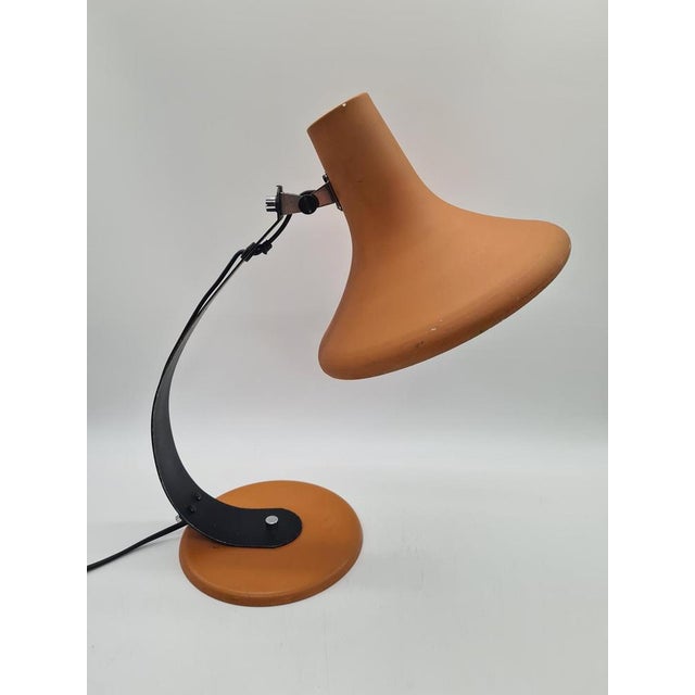 A unique Space Age-style desk lamp, made in Europe in the 1970s and 1980s. The model stands out with its distinctive...