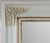 White lacquered frame mirror with gold leaf gilded finishes and white roses handmade decorations in pure Capodimonte...