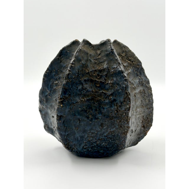 Sculptural organic vase by Danish ceramicist Helge Østerberg, dating from the 1960s. The softly curved silhouette is...