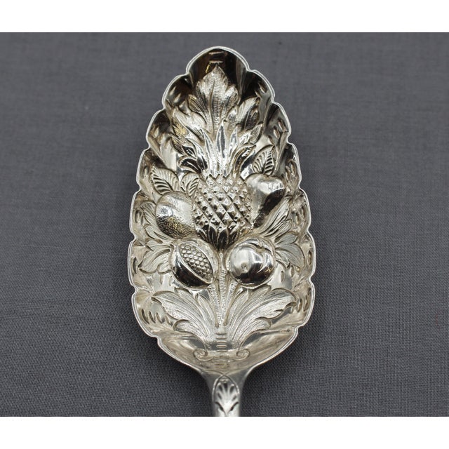 George III period pair of sterling silver serving spoons, English. Old English pattern. One by Peter, Ann & William...