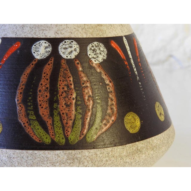 Multicolored vase, dark brown interior and hand-painted stripe in various colors Manufactured by Dümler & Breiden in Höhr...