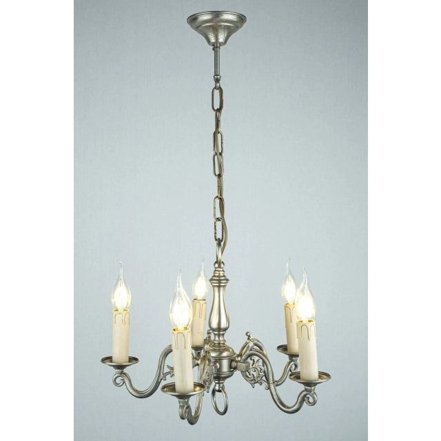 Very high-quality cast chandelier made of white brass. New power cable - fully functional - ready to use. The arms are...