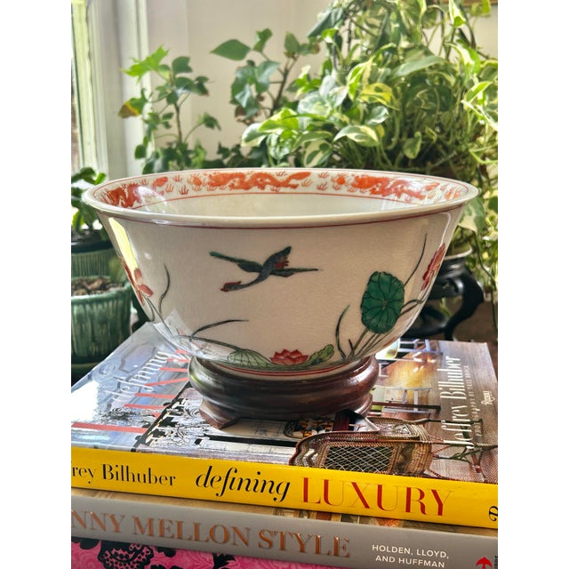 Found in a 1970’s estate near New Orleans, this mid-century decorative porcelain bowl features a vibrant, hand-painted...