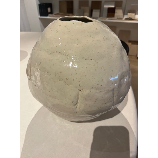 Dimensions: 14”w x 14”h Material: Stoneware Finishing: Glazed Color: Beige Edition: One-of-a-kind