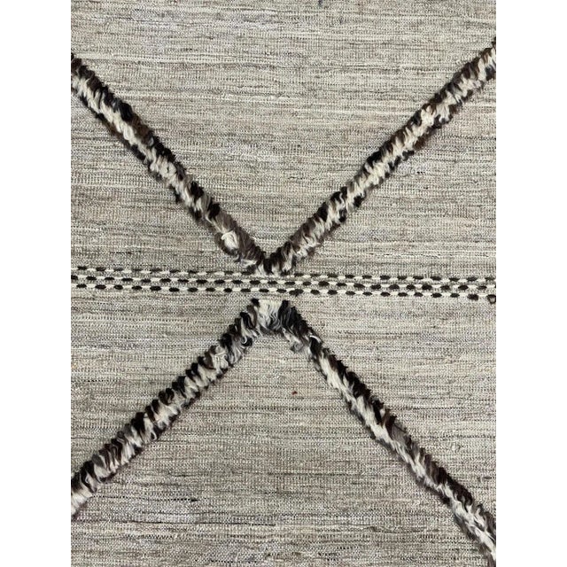 Beautiful hand knotted modern rug. Made of 75% wool and 25% cotton with very modern design and colors, this extremely...