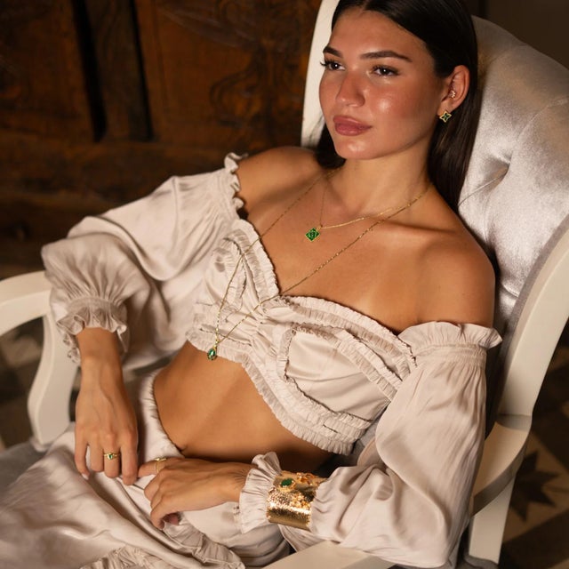 Step into the realm of protection and style with our Mystic Verde Evil Eye Gold Necklace. Featuring a striking green...