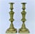Vintage brass candlesticks with English styling. Each uses one regular taper and has original push ups. Left in unpolished...