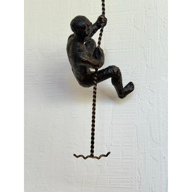 Mid 20th Century Vintage Modernist Cast Metal Hanging Sculpture of a Man Climbing For Sale - Image 5 of 12