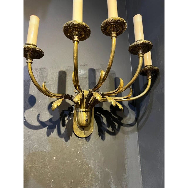 A pair of circa 1920's Caldwell 5 lights sconces with acanthus leaves