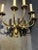 A pair of circa 1920's Caldwell 5 lights sconces with acanthus leaves