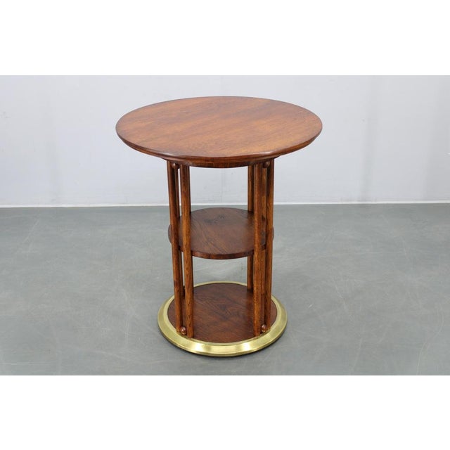 This refined Vienna Secession coffee table was produced in Czechoslovakia during the 1920s and reflects the architectural...