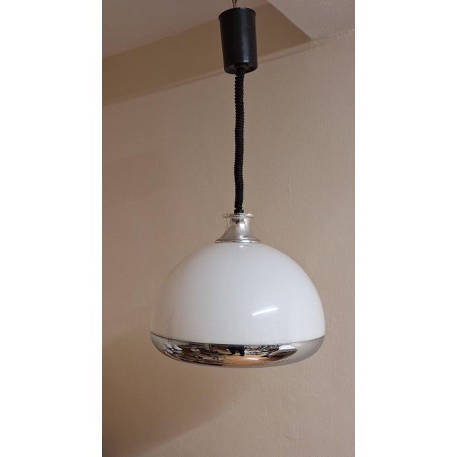Vintage Height-Adjustable Ceiling Lamp with White Plastic Shade and Chrome-Plated Metal, 1970s, in Good conditions....