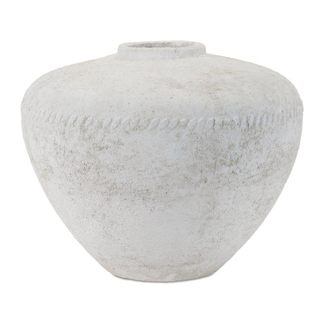 Earthy texture meets timeless design in this Distressed White Terra Cotta Vase. Featuring a softly weathered finish and a...