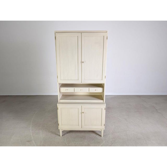 Beautiful vintage bookcase from the 1960s by Svante Skogh. The piece consists of two stackable modules. The upper section...