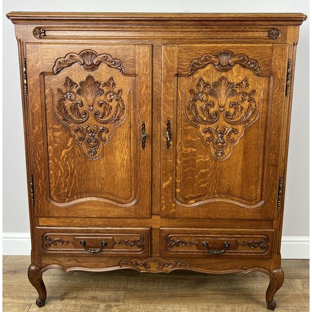 Bring timeless French charm into your home with this elegant Vintage French Louis Cabinet , beautifully crafted in oak...