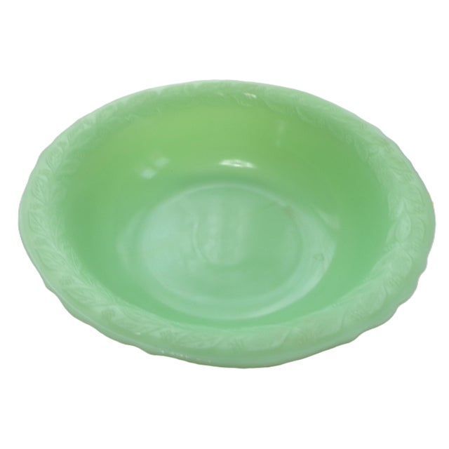 A pristine example of early McKee Jadite, this 1930s mixing/serving bowl features the distinctive Triple Leaf (Laurel...