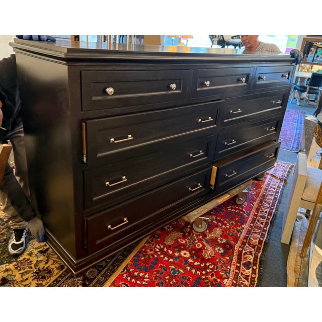 Design Plus Gallery presents a Chest of Nine Drawers from Grace Home Furnishings. The dresser is great for holding onto...