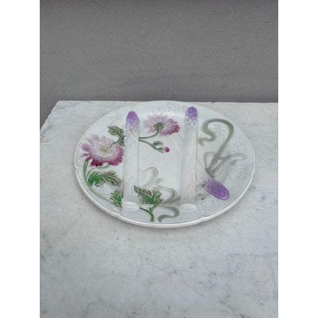 Majolica Art Nouveau asparagus plate with mums signed Keller et Guerin Saint Clement. 9 inches diameter. Every important...