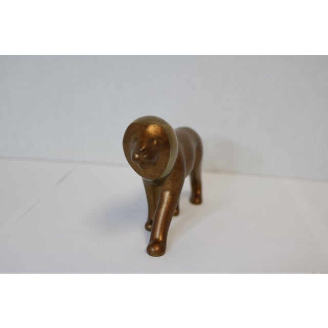 Beautiful, bronze lion by world renown sculptor Loet Vanderveen (1921-2015). The majestic lion is an exquisite example of...