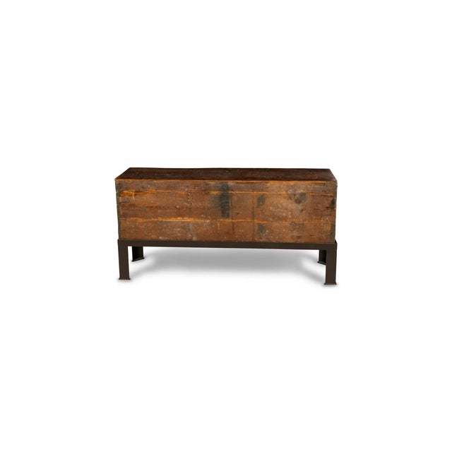 An exceptional 19th-century Chinese low cabinet featuring three beautifully hand-painted front door panels within shaped,...