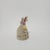Vintage porcelain figurine depicts a courtly musical scene featuring a man playing the violin and a woman seated at a...