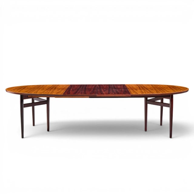 Arne Vodder for Sibast Mid Century Danish Rosewood Expanding Oval Dining Table with 2 Leaves This table measures: 78 wide...