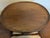 This is an Antique Mahogany Mersman 3 Tier Stand or Tea Table with Claw Feet 1930s Era An antique mahogany three tier...