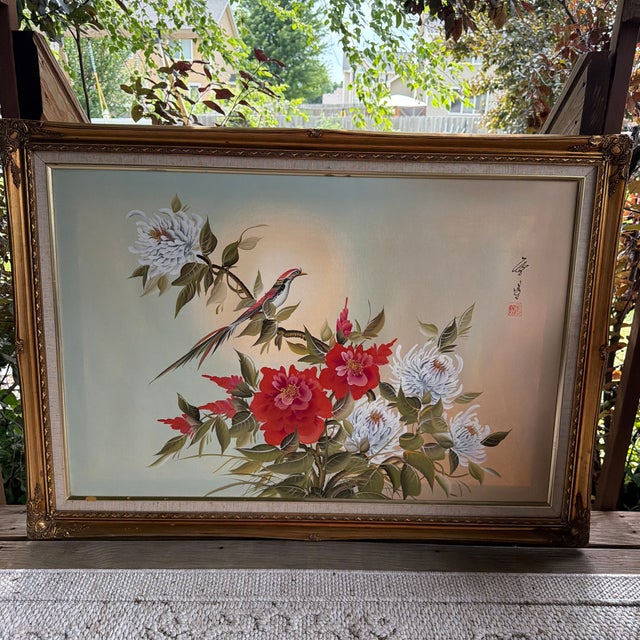 A beautifully composed mid-century Chinese silk painting featuring a graceful long-tailed bird perched among lush peonies...