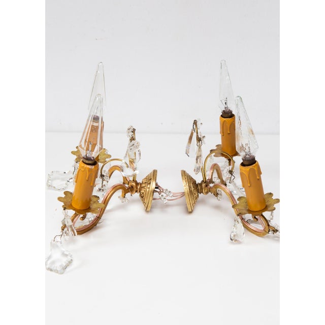 They operate with two E14 type bulbs European Plug (up to 250V).The wiring of this item may be original and might need...