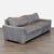 This Restoration Hardware 3-seat sofa features a modern design with a sturdy frame and gray leather upholstery. The wide...
