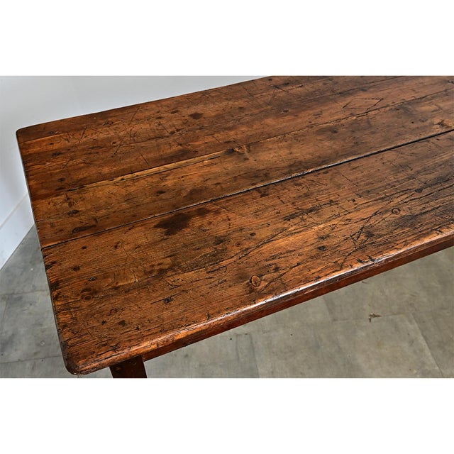 This 19th-century table is large enough to comfortably accommodate 10 sitters. The tabletop is made from three long planks...