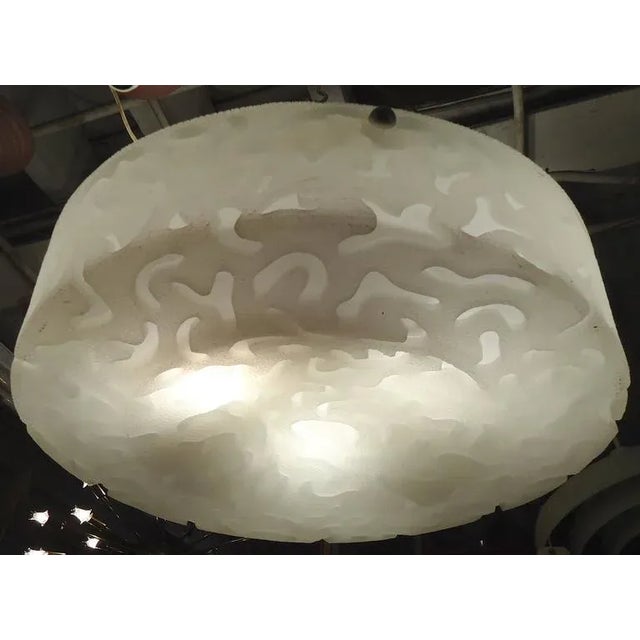 Round hanging chandeliers with textured shade. Silver painted metal support, three medium sockets. CONDITION Good...