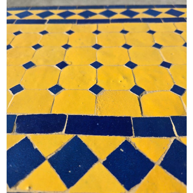 Add colorful Mediterranean-inspired charm to your home, patio, or garden with this decorative mosaic tile accent table....