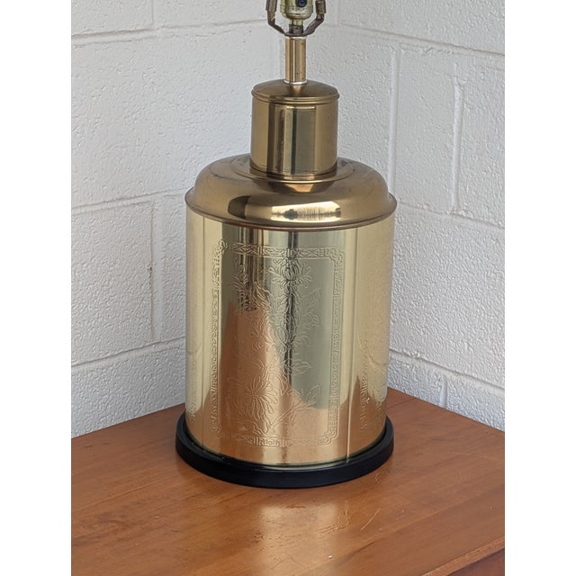 This sophisticated table lamp began its life as a handcrafted brass tea canister before being expertly converted....