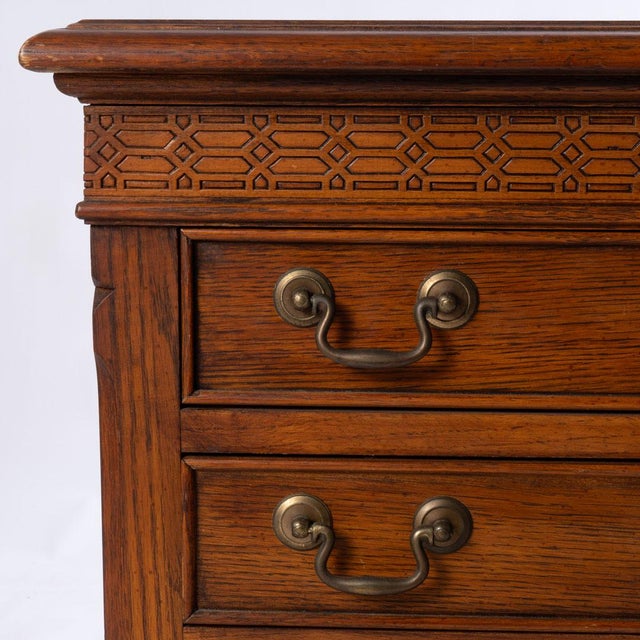 Small quality four drawer chest with dovetailed drawers. Detailed carvings above drawers. Great for a bedroom side table...