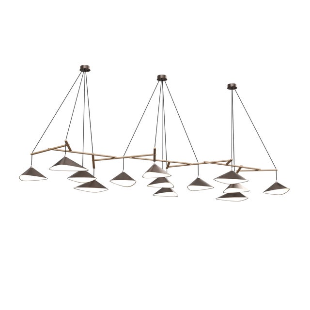 Emily is a series of handmade sheet steel lampshades in various finishes and spatial arrangements. _ Emily was inspired by...