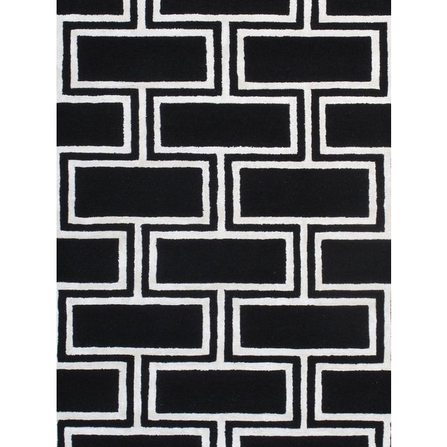 Add a touch of modern elegance to your home with Pasargad Home's Edgy Hand-Tufted bamboo Silk & Wool Area Rug. Made of...
