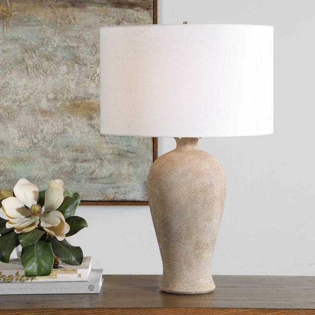 A Classic Silhouette Meets Organic Texture In This Stunning Ceramic Table Lamp. The Mottled Neutral Tones Accented By...