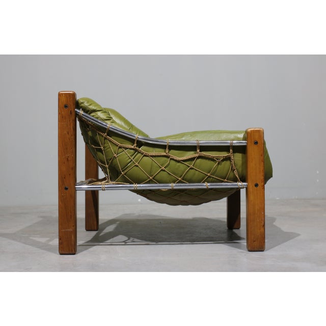 his Brazilian leather lounge chair and ottoman by Jean Gillon reflects the sculptural elegance and material richness of...