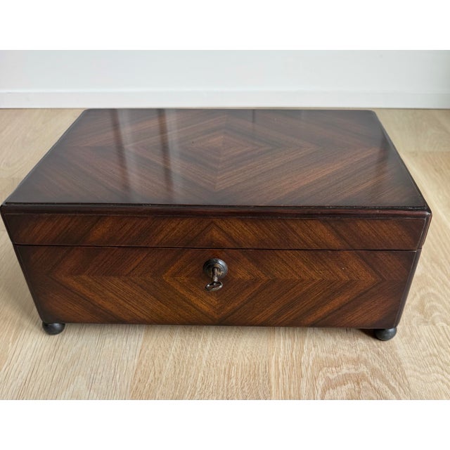 Adorn a desk, dressing room, or library with this sophisticated Theodore Alexander walnut veneer and solid walnut box,...