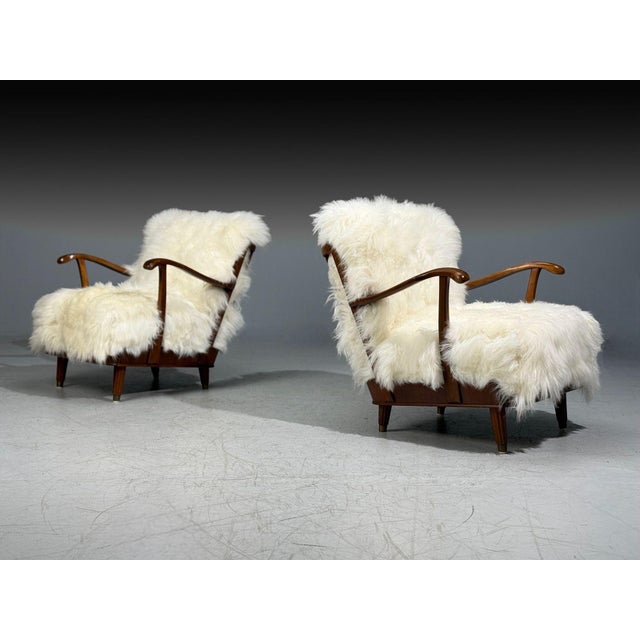 Svante Skogh, Swedish Mid-Century Modern, Lounge Chairs, Mongolian Fur, Beech, Sweden, 1945 Pair of gorgeous lounge chairs...