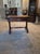 This furniture piece is a 19th-century Victorian or Regency-style trestle side table, likely crafted from a rich hardwood...