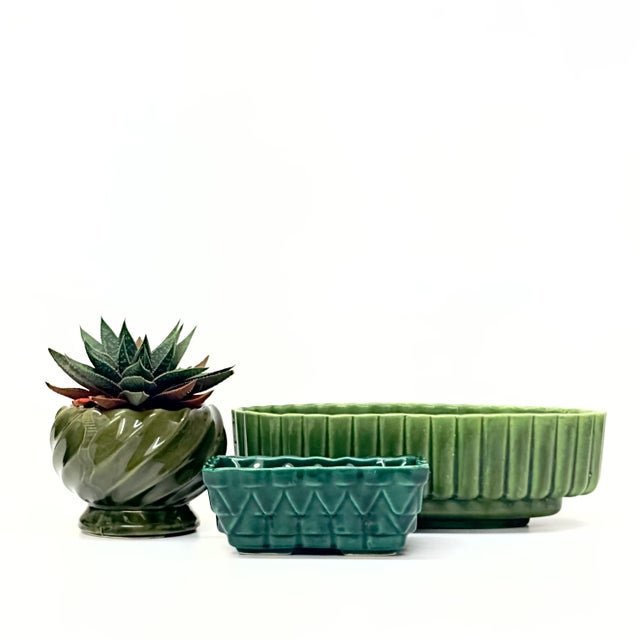 Mixed green planters, group of 3. A statement set of textured green ceramic planters from the mid 20th century. Shortest:...