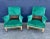 This is an uncommon pair of mid-19th century club chairs in the style of Howard & Sons. These very generous chairs are in...