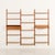 This elegant mid-century wall unit closely resembles poul cadovius or preben sorensen designs and was made in the same...