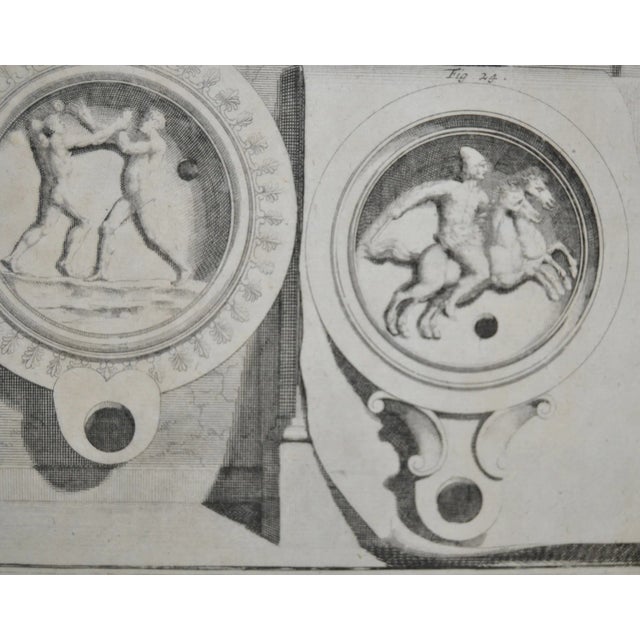 Beautiful 19th century engraving depicting Roman oil lamps. Comes unframed. Very good condition! Measures 9 1/4" x 15 1/4".