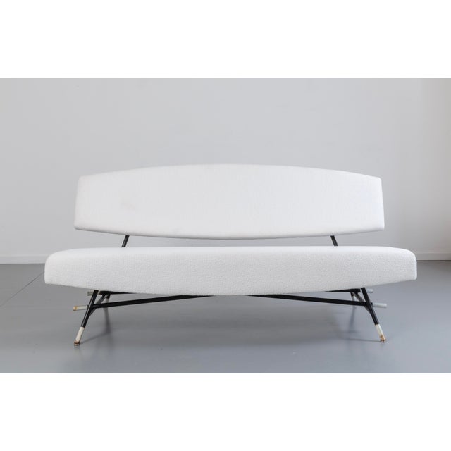 Painted tubular steel frame; padded backrest and seat upholstered in fabric. I have official proof of authenticity such as...